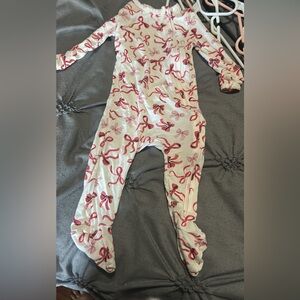 Pottery Barn Kids Cream Footed One-Piece with Pink Bow Print